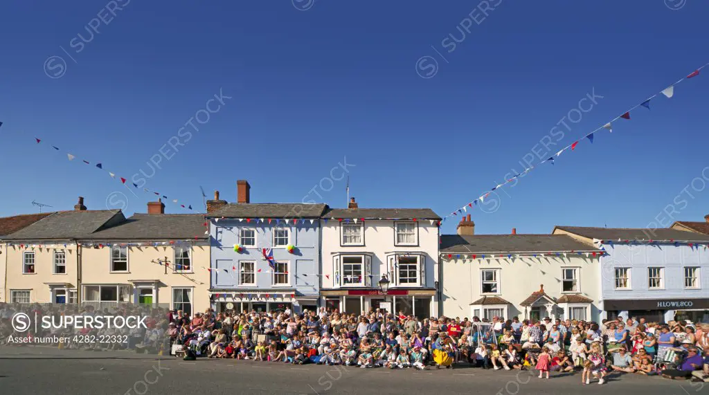 England, Essex, Thaxted. Crowds gather in Watling Street for the centenary Thaxted Morris Dancing Festival.