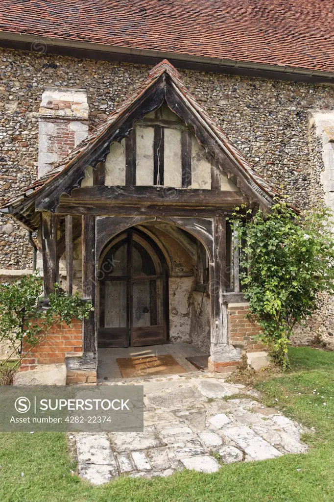 England, Essex, Belchamp Walter. Built of brick and flint, the oldest parts of St Mary the Virgin church date from the early 14th Century.