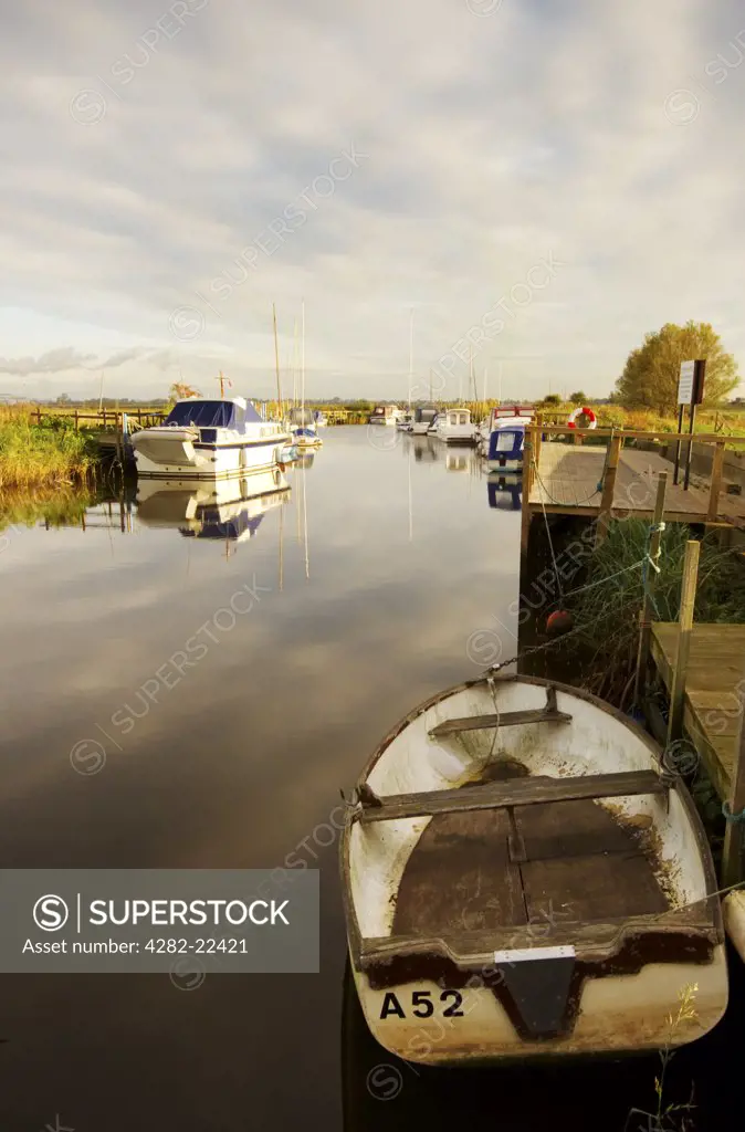 England, Norfolk, Hardley. Boats moored at Hardley Staithe on the River Yare in Norfolk.