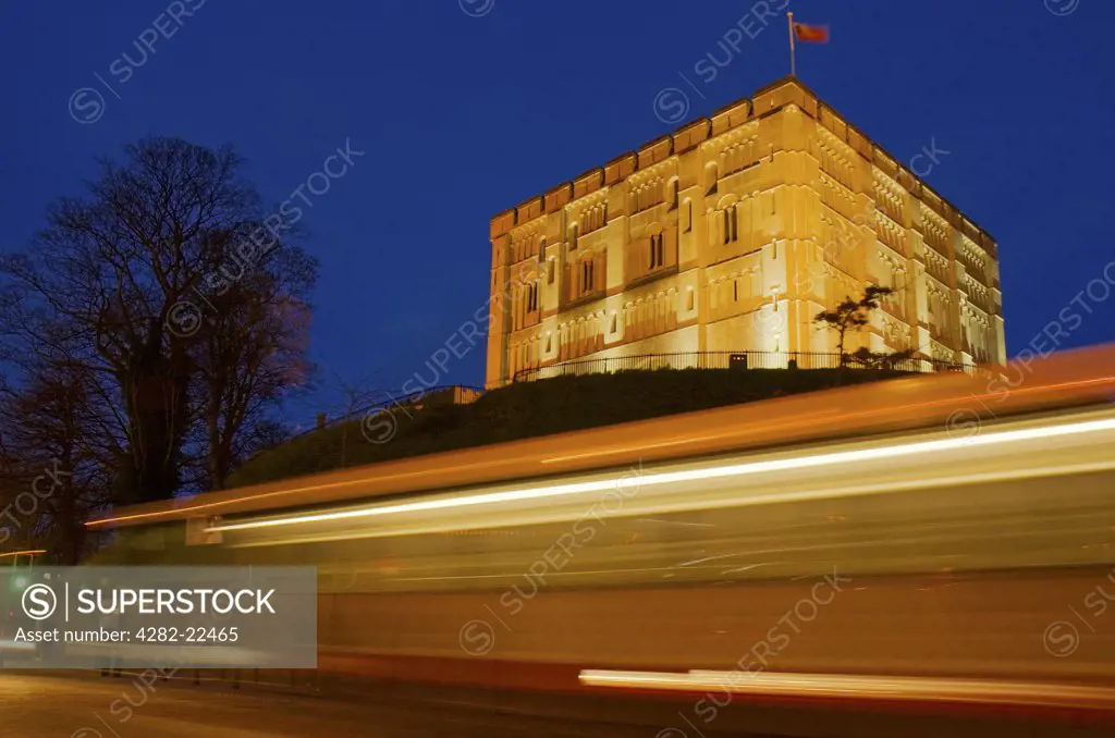 England, Norfolk, Norwich. A view up toward Norwich Castle at night.