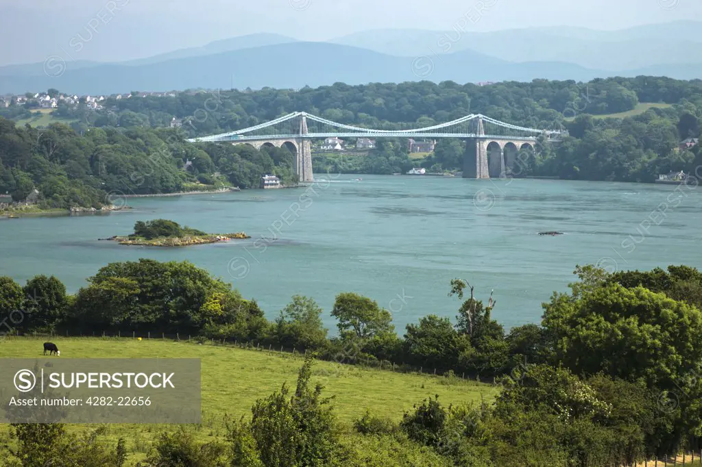 Wales, Anglesey, Menai Bridge. The Menai Suspension Bridge connecting the island of Anglesey with mainland Wales, designed by Thomas Telford and opened in 1826.