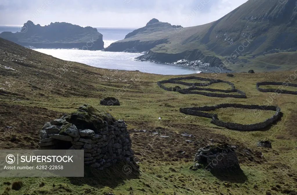 Scotland, Western Isles, St Kilda. A cleit and stone enclosures on the island of Hirta, one of four volcanic islands that make up the archipelago of St Kilda.
