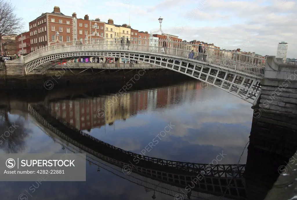 Republic of Ireland, Dublin, Dublin. Halfpenny Bridge, onetime toll bridge over the River Liffey, Dublin.