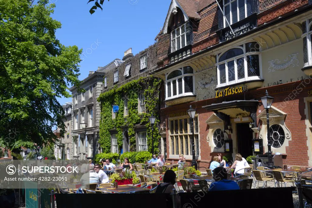 England, Norfolk, Norwich. People sitting outside La Tasca Spanish Tapas Bar & Restaurant in the Tombland area of Norwich.