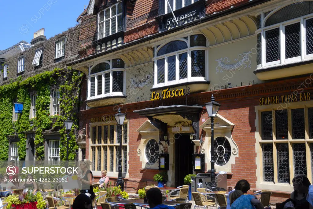 England, Norfolk, Norwich. People sitting outside La Tasca Spanish Tapas Bar & Restaurant in the Tombland area of Norwich.