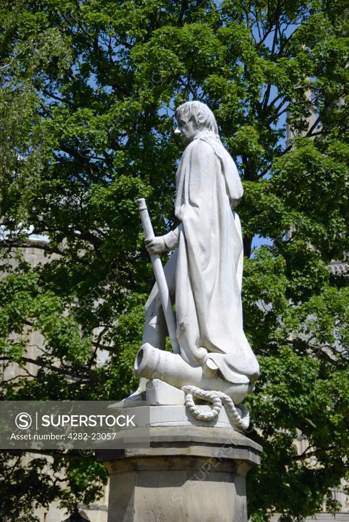 England, Norfolk, Norwich. Statue of Vice-Admiral Horatio Nelson in the grounds of Norwich cathedral, close to Norwich School (previously King Edward VI's Grammar School) at which Nelson was a pupil.