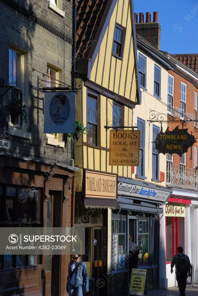 England, Norfolk, Norwich. Shop fronts in the historic Tombland area, site of the original marketplace of Anglo-Saxon Norwich.