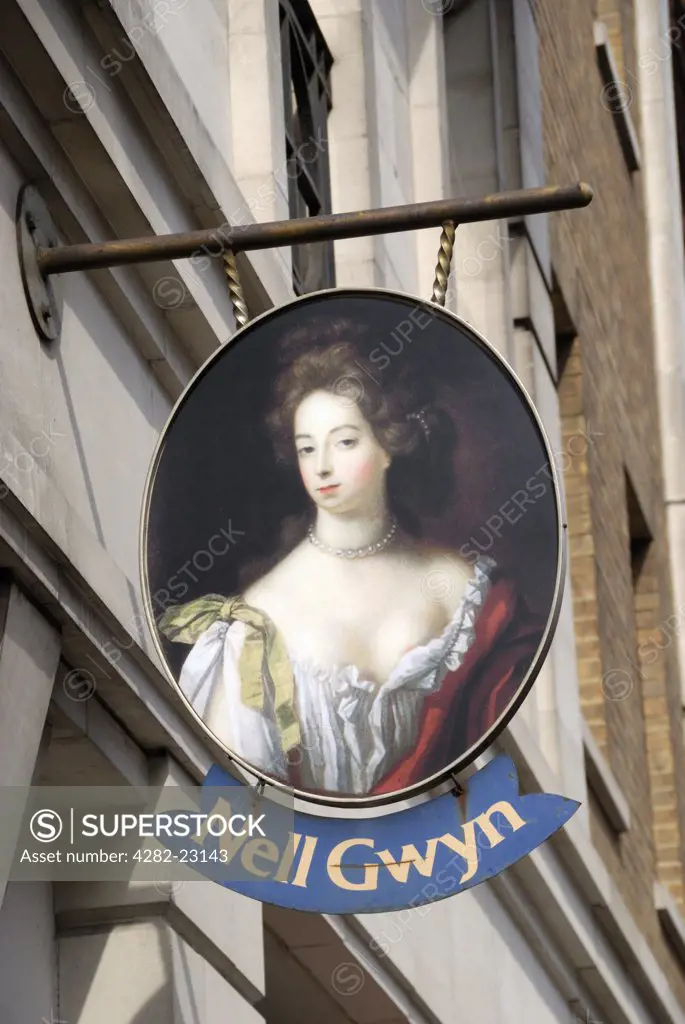 England, London, Westminster. Nell Gwyn tavern sign hanging outside the pub off the Strand in central London.