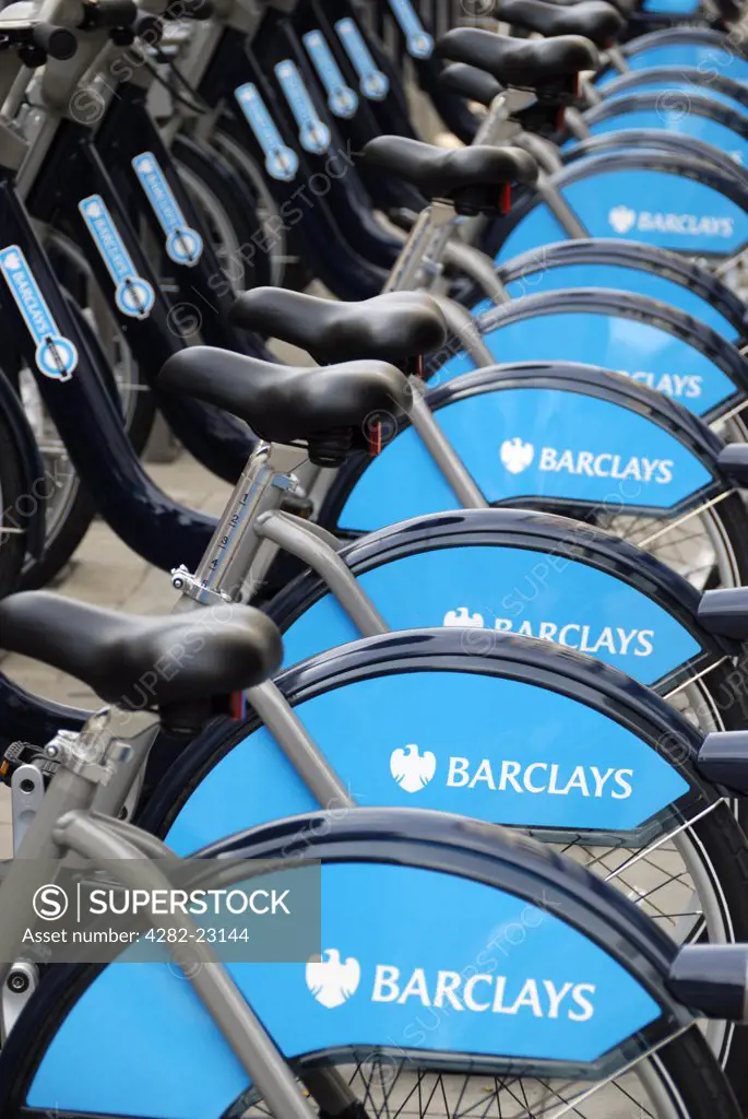 England, London, Westminster. A row of Barclays Cycle Hire bicycles parked in a docking station.