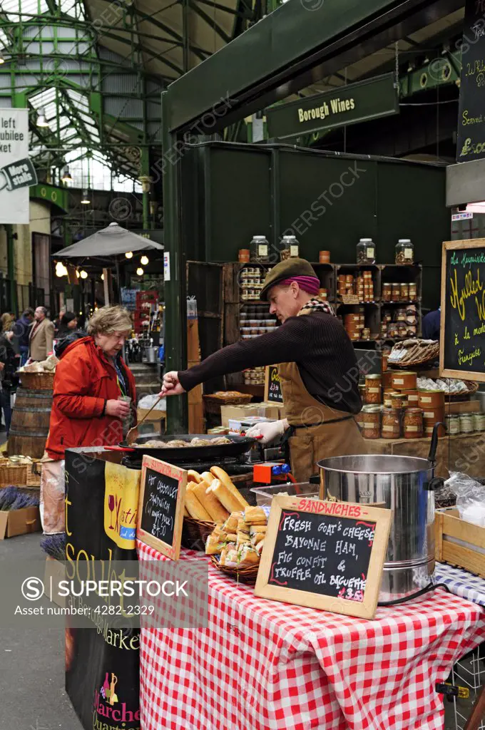 England, London, Borough Market. French produce for sale on a stall at Borough Market in Southwark.