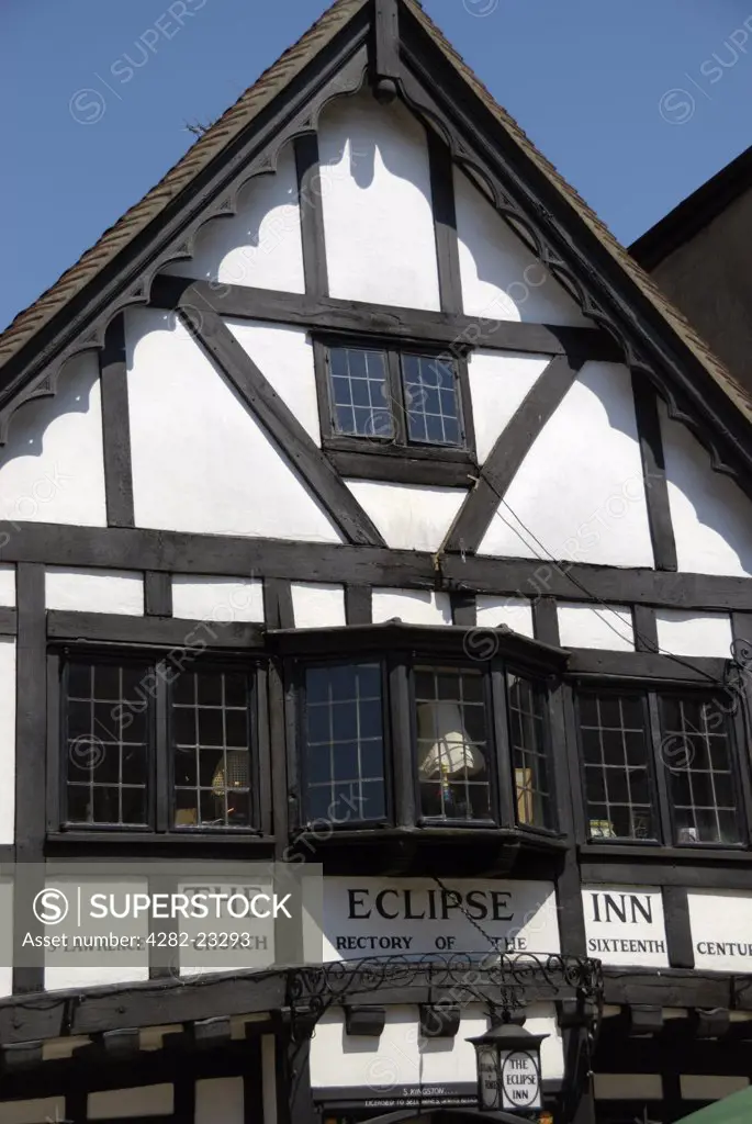England, Hampshire, Winchester. The Eclipse Inn in The Square. The black and white half-timbered building dates back to 1540 and was formerly a rectory (to the Church of St Lawrence) before becoming a public house in 1890.