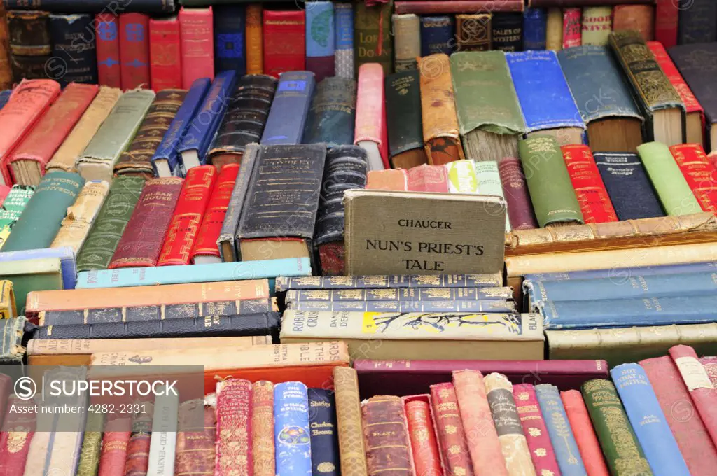 England, London, Notting Hill. Secondhand books for sale on a stall at Portobello Road Market.