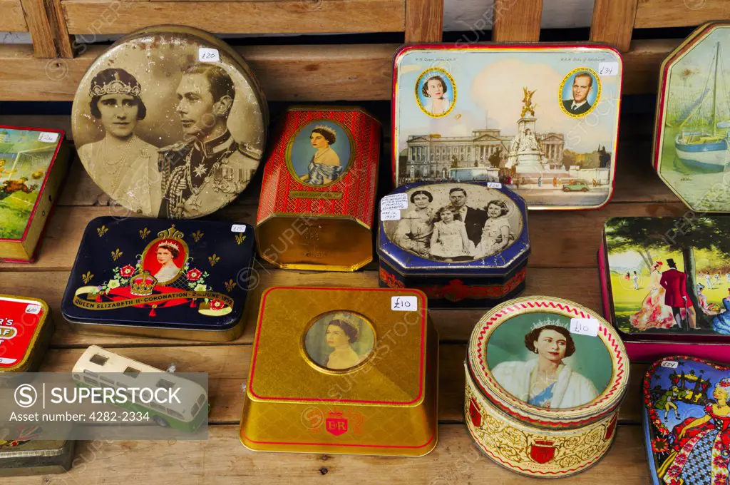 England, London, Notting Hill. British Royal Family commemorative memorabilia on sale at Portobello Road Antiques Market.