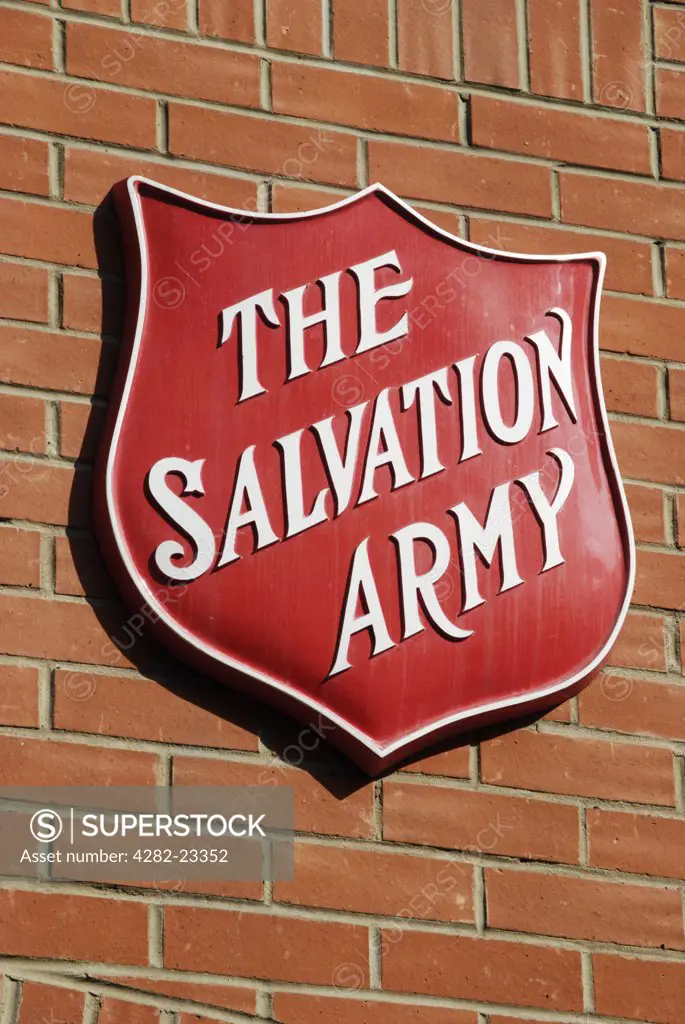 England, London, Westminster. Salvation Army shield logo on a wall.