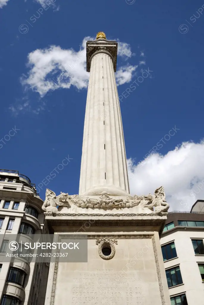 England, London, The City. The Monument to the Great Fire of London 1666, designed by Sir Christopher Wren and Robert Hooke.
