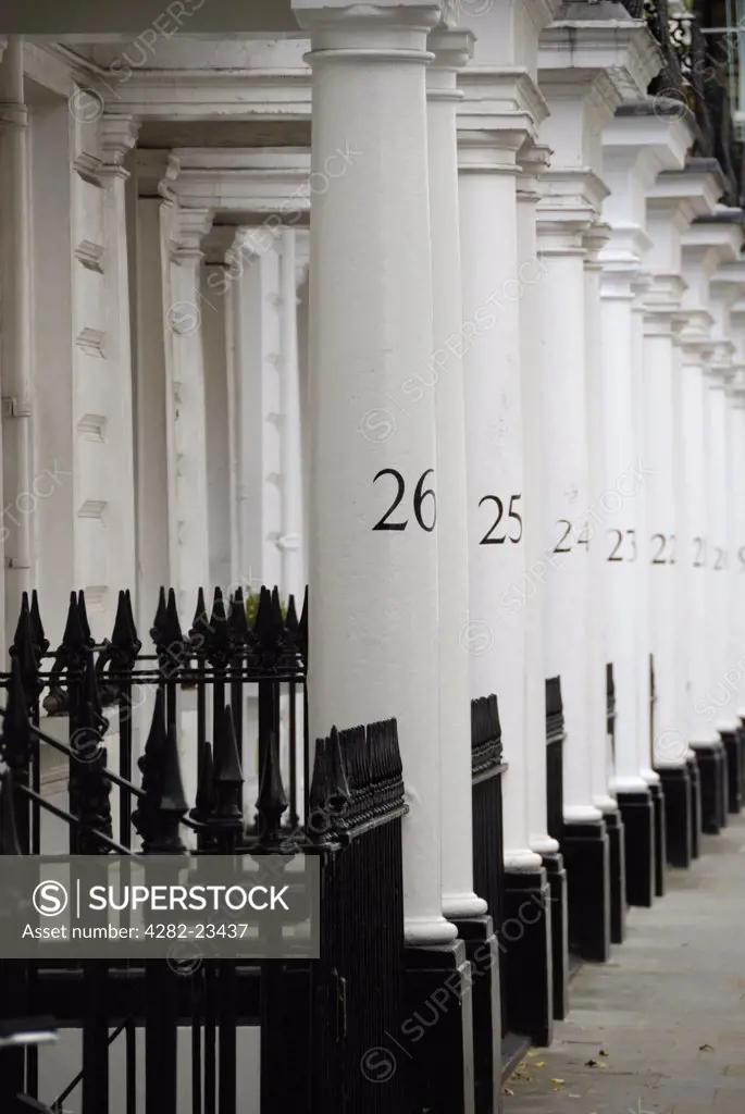 England, London, Chelsea. Numbered white stone columns in Neville Street SW7.