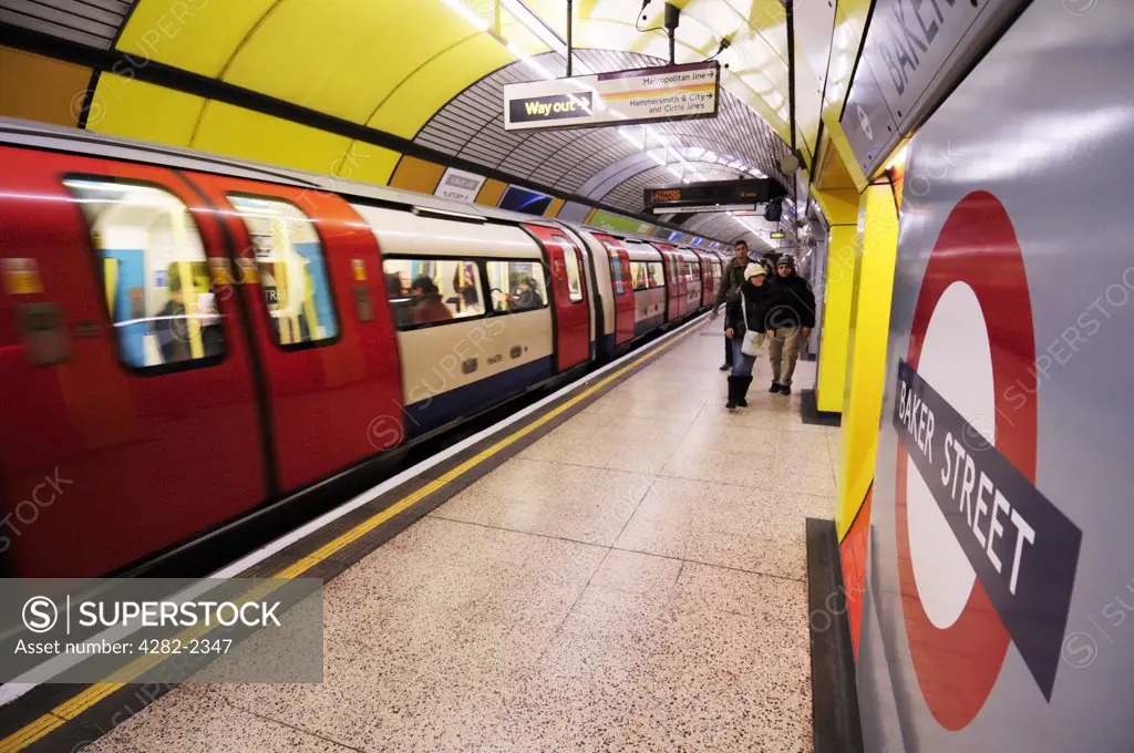 England, London, Baker Street. Passengers walking towards the exit along a Jubilee line platform at Baker Street Underground Station.