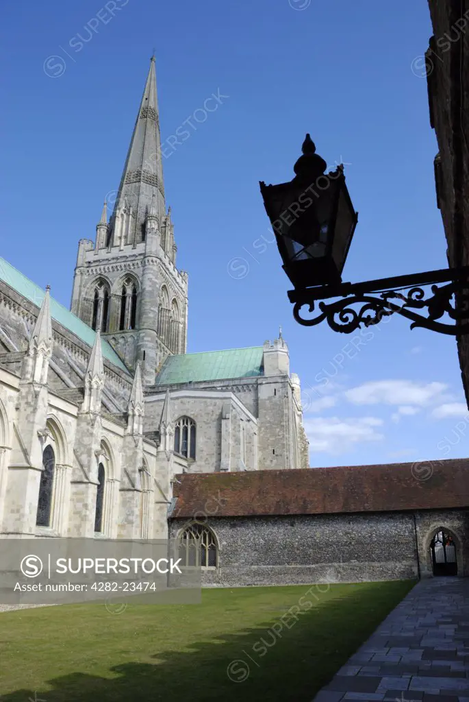 England, West Sussex, Chichester. Chichester Cathedral and cloister building. The spire is a landmark for sailors as Chichester is the only English Cathedral visible from the sea.