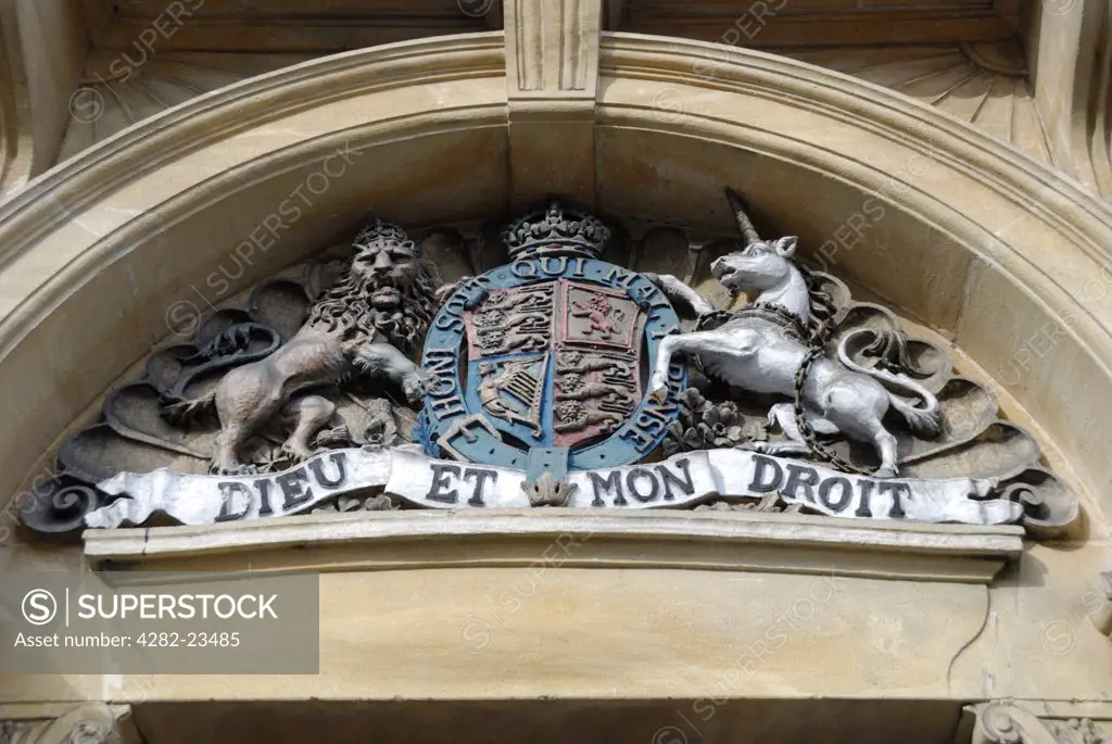 England, Buckinghamshire, High Wycombe. 'Dieu et Mon Droit' motto and crest of the British Monarch on the exterior of a building.