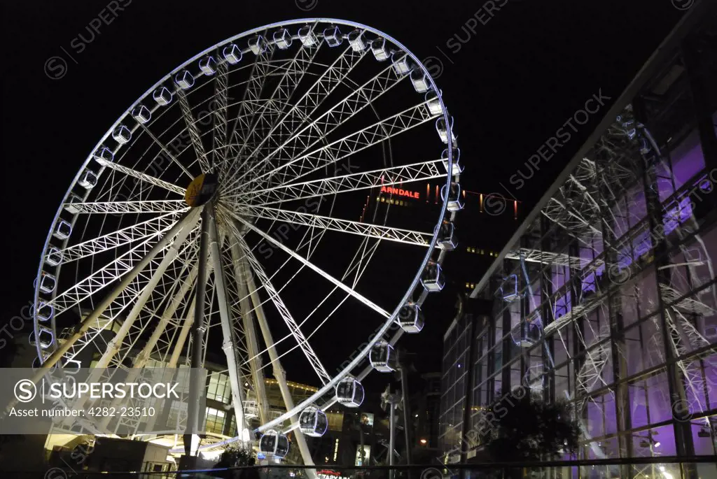 England, Greater Manchester, Manchester. The Wheel of Manchester at night. The wheel has 42 capsules which seat up to eight people to offer spectacular views over one of the fastest changing urban landscapes in Europe.