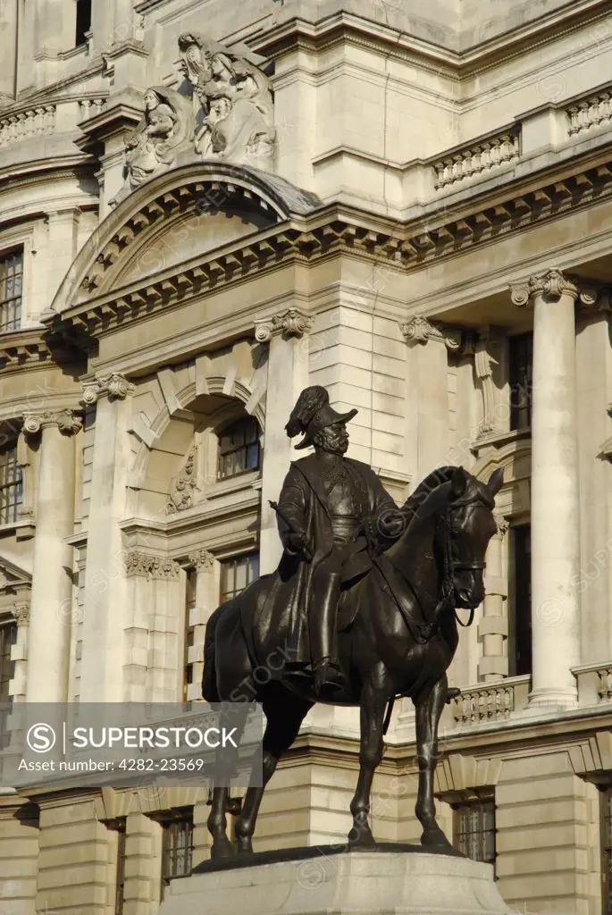 England, London, Westminster. View to a statue of a horseman and classical architecture in Whitehall.