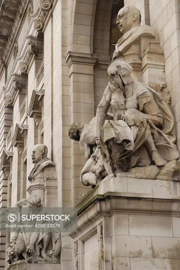 England, London, South Kensington. Statues on the Victorian building facade at the Imperial College of Science, Technology and Medicine in London.