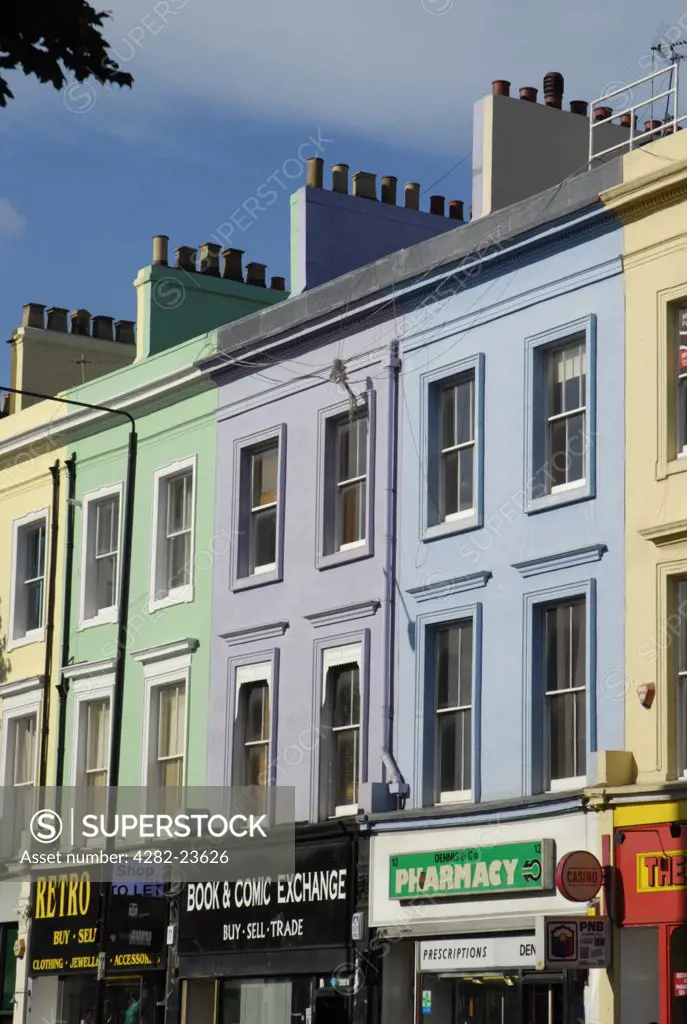 England, London, Notting Hill. Colourful painted buildings above shops at Pembridge Road in Notting Hill.
