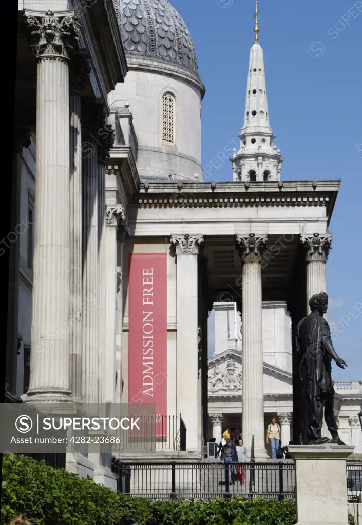 England, London, Trafalgar Square. The National Gallery with a view to St Martin's in the Field church.