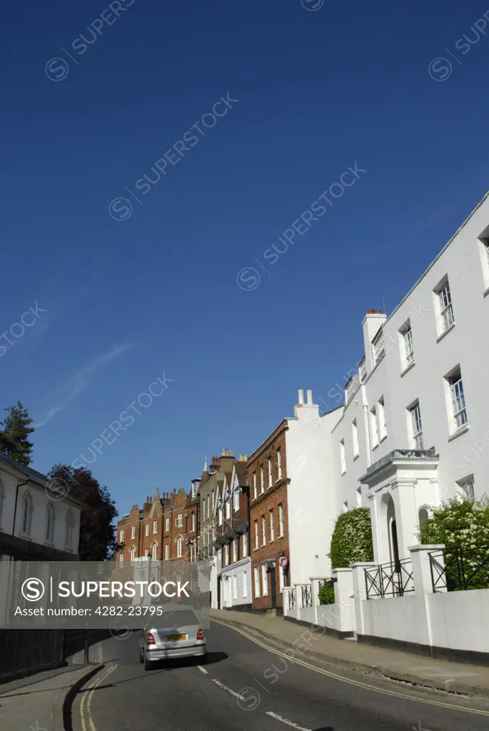 England, London, Harrow on the Hill. A blue sky over the buildings of Harrow on the Hill in London.