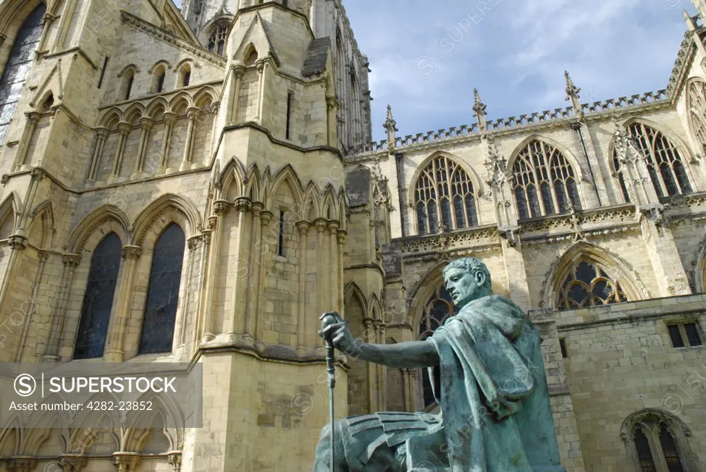 England, North Yorkshire, York. Statue of Constantine the Great and south face of York Minster.