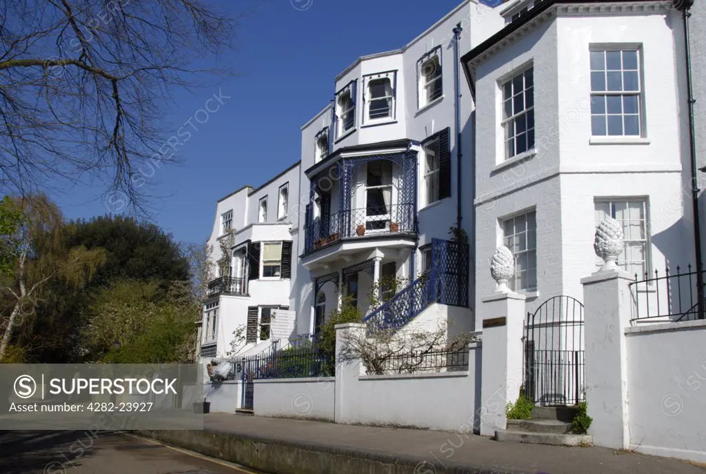 England, London, Twickenham. A side view of elegant white houses on the Riverside in Twickenham.