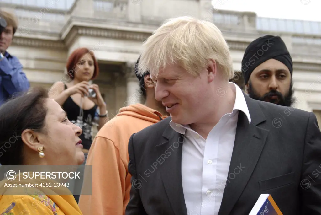 England, London, Trafalgar Square. Boris Johnson talking to Indian woman at the 2008 Vaisakhi Sikh New Year Festival.