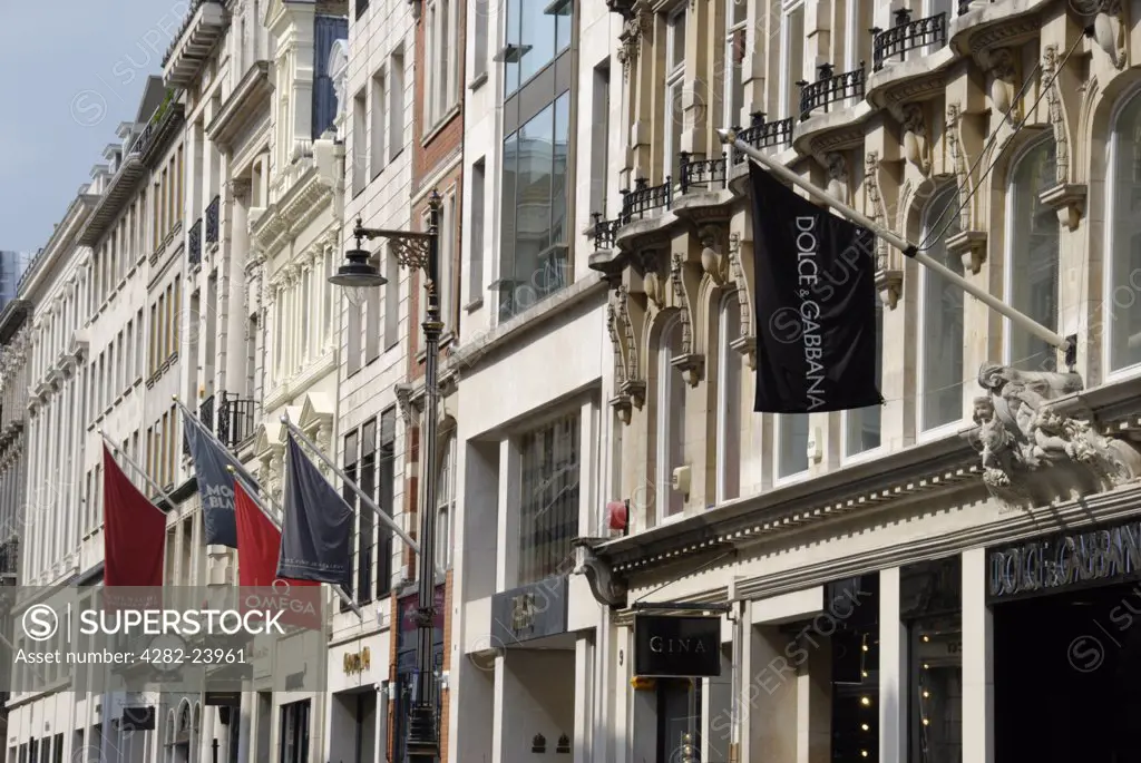 England, London, Bond Street. Designer fashion and jewellers shop fronts on Old Bond Street.