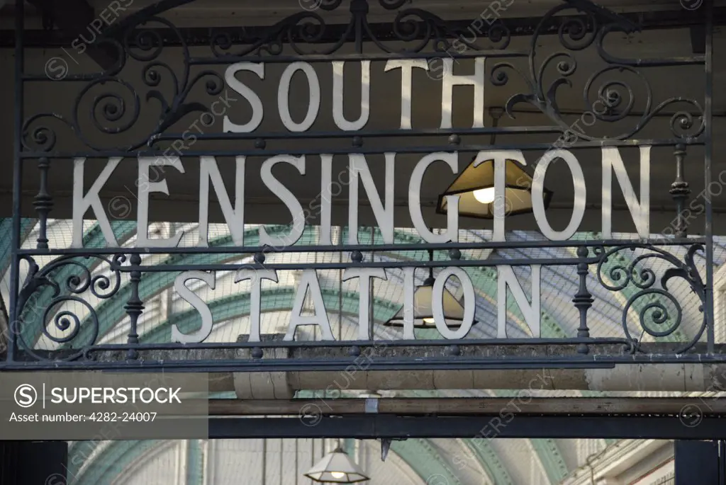 England, London, South Kensington. Close up of a Victorian wrought iron sign outside South Kensington Underground station.