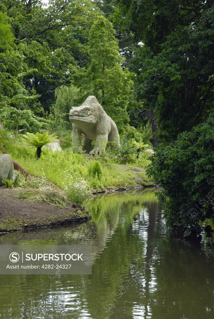 England, London, Crystal Palace. A Megalosaurus dinosaur statue in Crystal Palace Park.