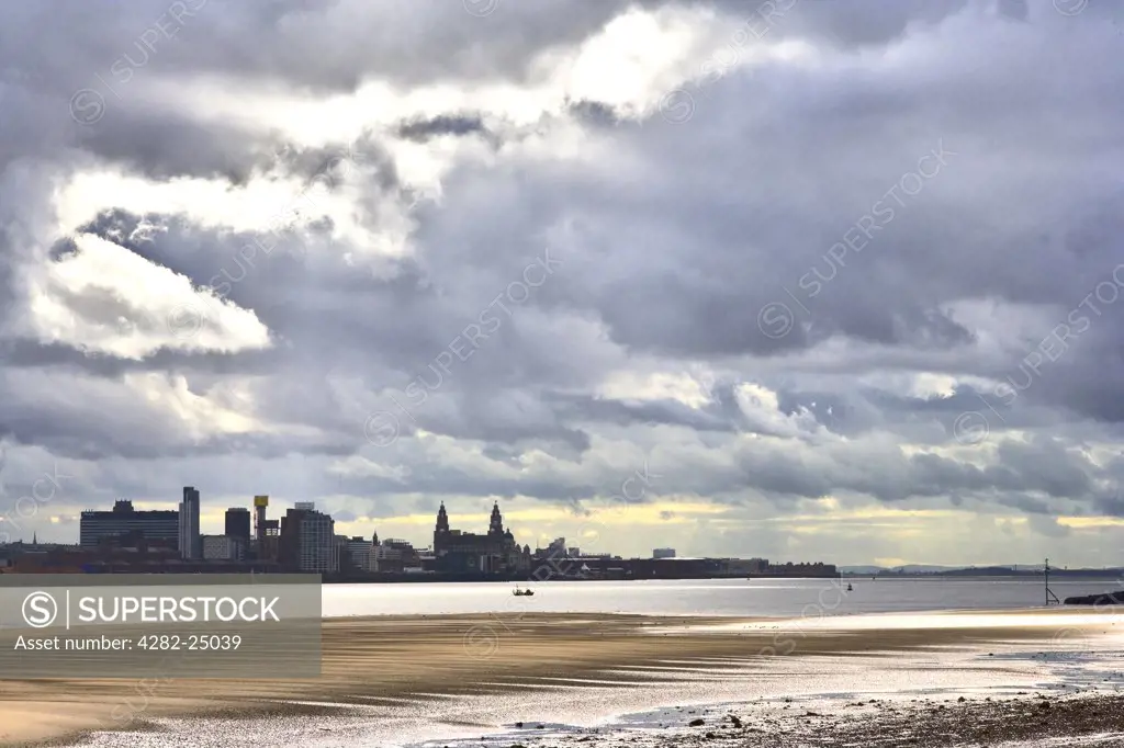 England, Merseyside, Liverpool. Liverpool across the Mersey from New Brighton. Between the 17th and 18th centuries Liverpool was the largest shipping port in the world.
