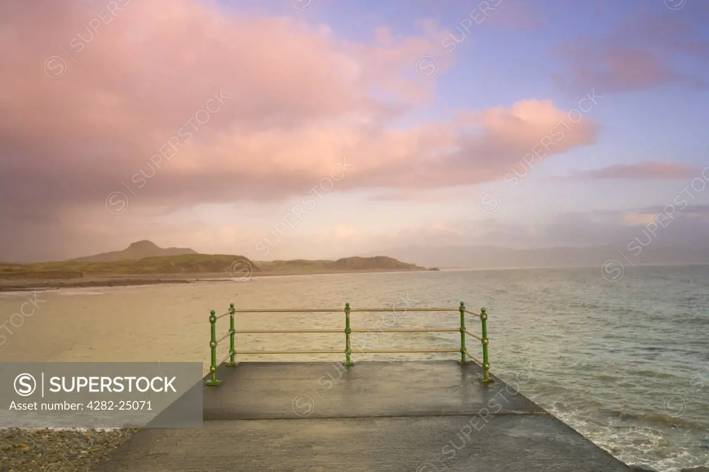 Wales, Gwynedd, Criccieth. View from Cardigan Bay out to Black Rock. Cardigan is an ancient Welsh cultural and commercial centre on the Teifi estuary, now a thriving market town famous for its many festivals.