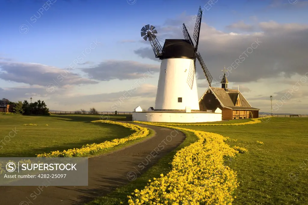 England, Lancashire, Lytham St Annes. The windmill and the former RNLI lifeboat station at Lytham St Annes. The town's bygone age and colourful past is clearly illustrated, constantly highlighting its Victorian values and unforgettable charm.