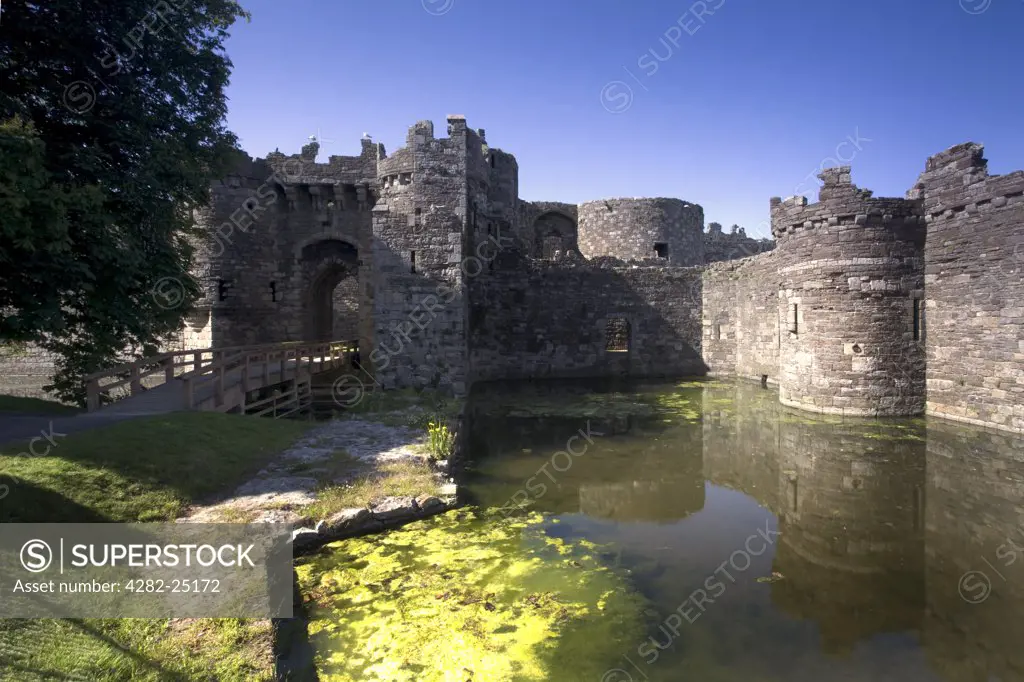 North Wales, Isle of Anglesey, Beaumaris Castle. A footbridge over the maot surrounding Beaumaris Castle.