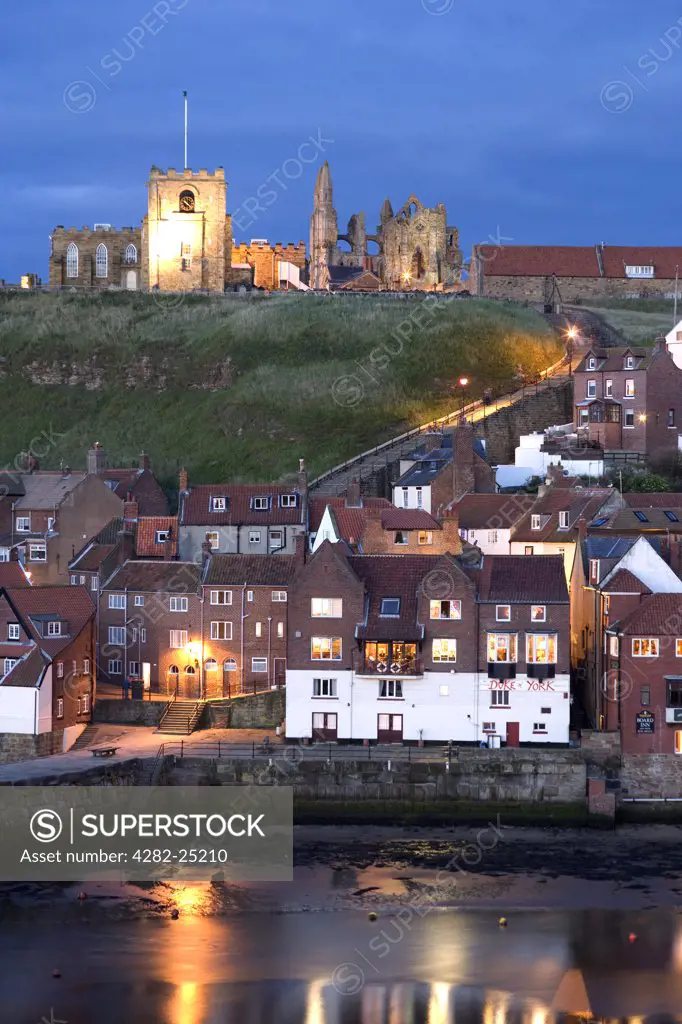England, North Yorkshire, Whitby. Whitby Quay at dusk.