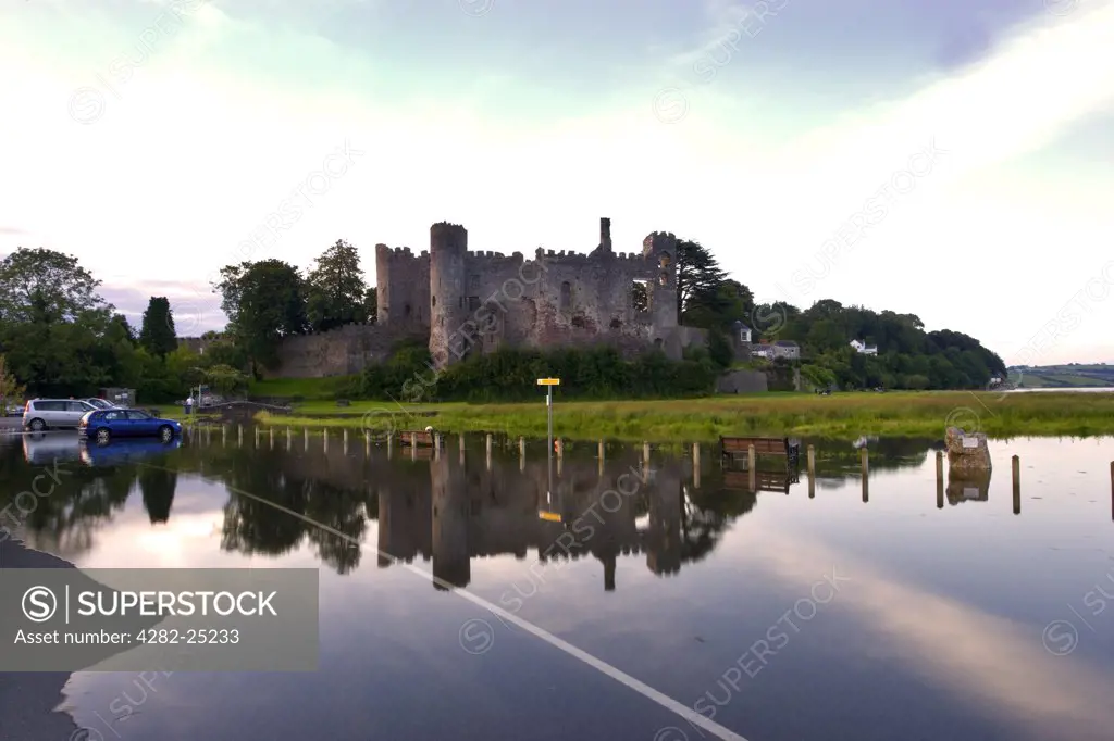 Wales, Carmarthenshire, Laugharne. A view toward Laugharne Castle and the river Taf.