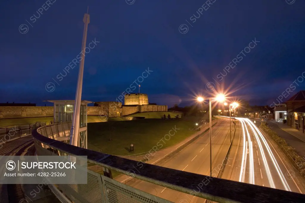 England, Cumbria, Carlisle. A view toward Carlisle Castle at night. Carlisle Castle is a great medieval fortress that has watched over the City of Carlisle for over nine centuries.