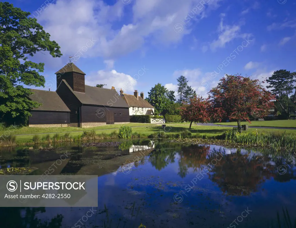 England, Surrey, Buckland Barn. Buckland Barn and pond.