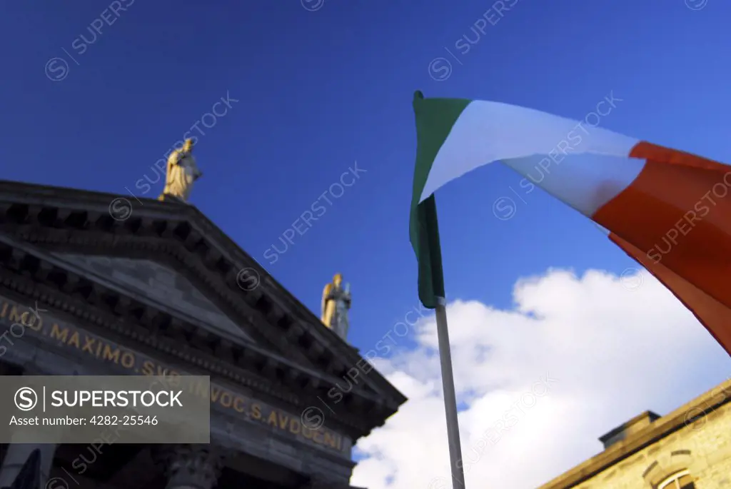 Republic of Ireland, Dublin, St Audoen's Church. An Irish flag flying outside St Audoen's Church in Dublin.