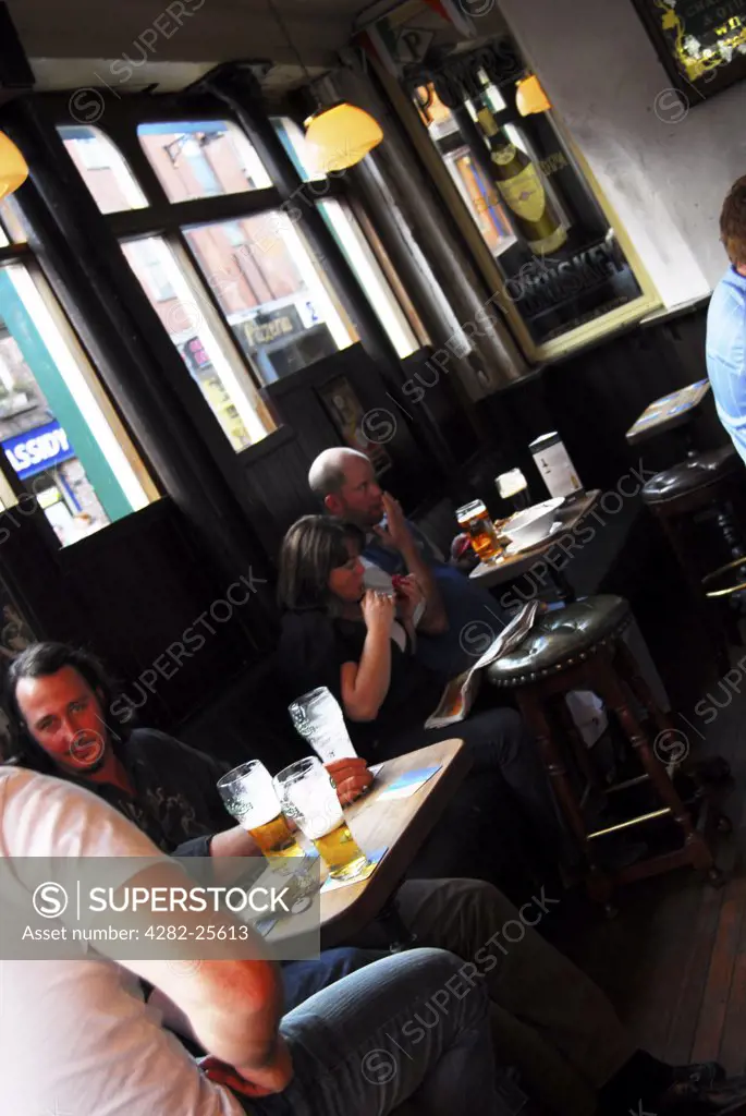Republic of Ireland, Dublin, Temple Bar. Drinkers at Lott's Pub in the Temple Bar area of Dublin.