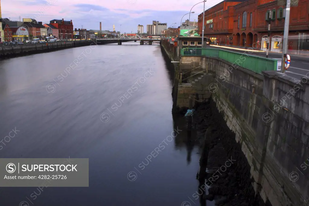 Republic of Ireland, County Cork, Cork. A view of the River Lee at dusk in County Cork.