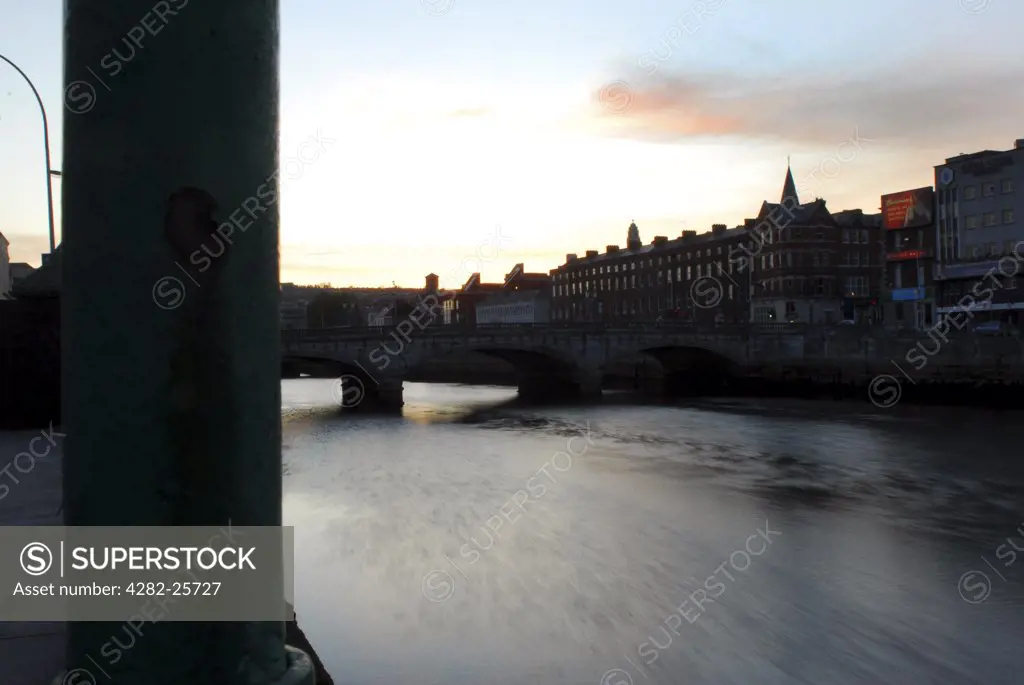 Republic of Ireland, County Cork, Cork. A view of the River Lee at dusk in County Cork.