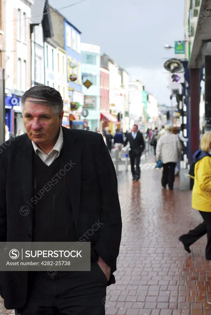 Republic of Ireland, County Cork, Central Cork. Shoppers in the streets of central Cork.