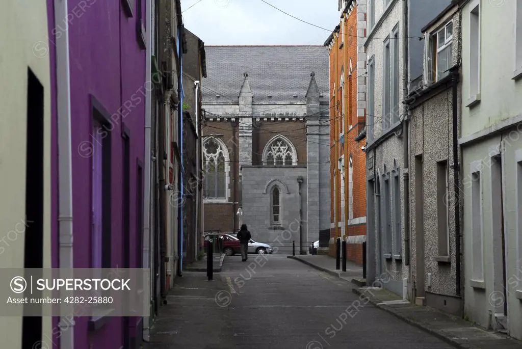 Republic of Ireland, County Cork, Shandon. A view down a street toward a church in Shandon.