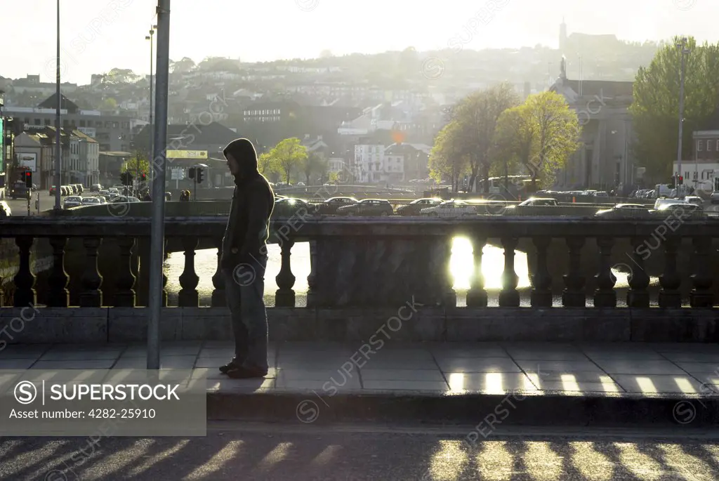 Republic of Ireland, County Cork, Central Cork. Sunlight behind St Patrick's Bridge in  Cork.